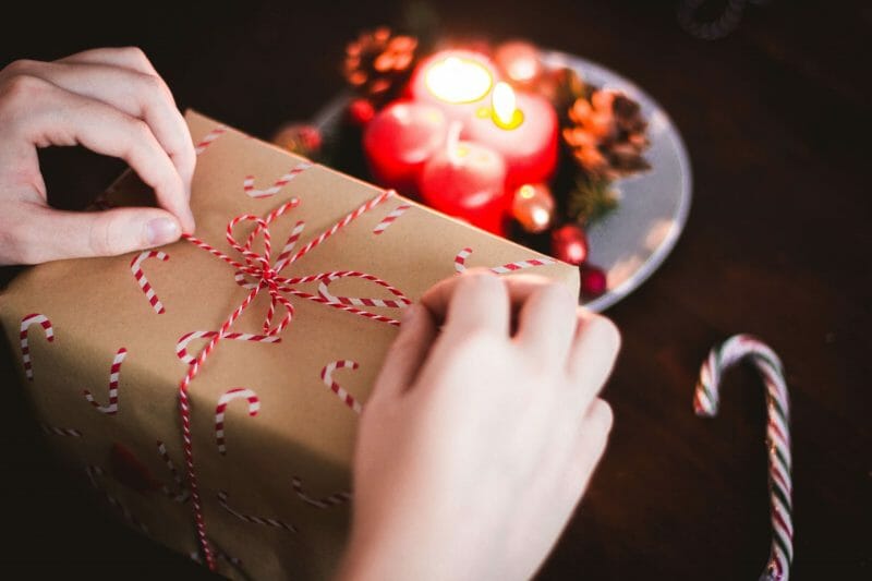 Girl opening leap year birthday gift box