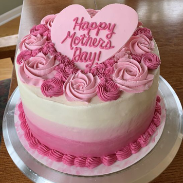 Mother’s Day special cake with pink ombré frosting and rose decorations