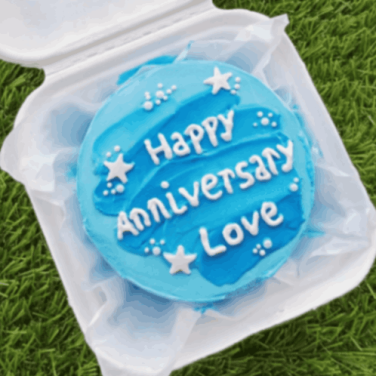 A round shape light blue romantic bliss cake for anniversary celebration